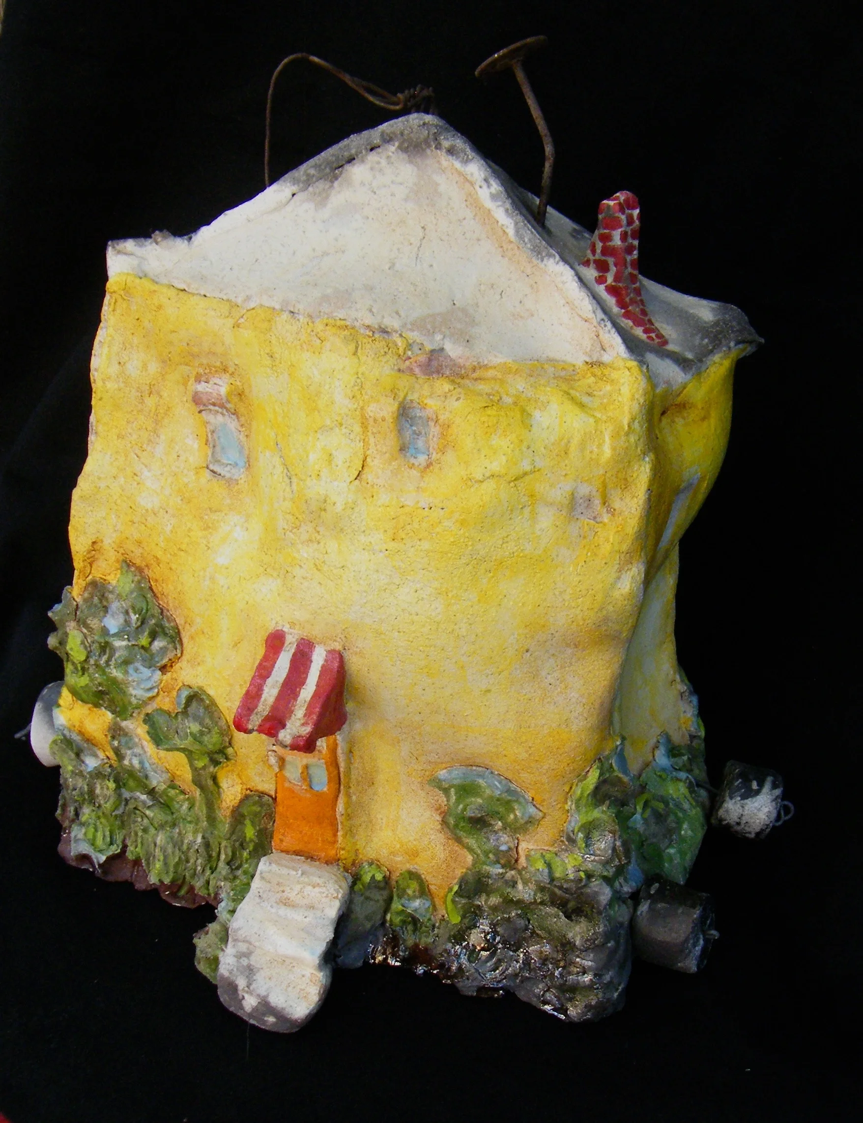 Inhaling Yellow House 12H x 10.5W x 4.5D.jpg