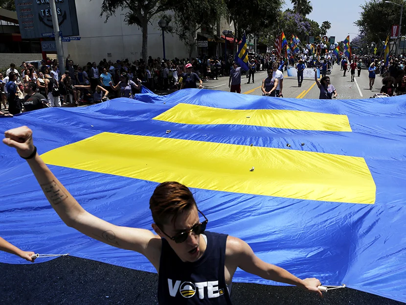 Transgender equality moves forward on both coasts