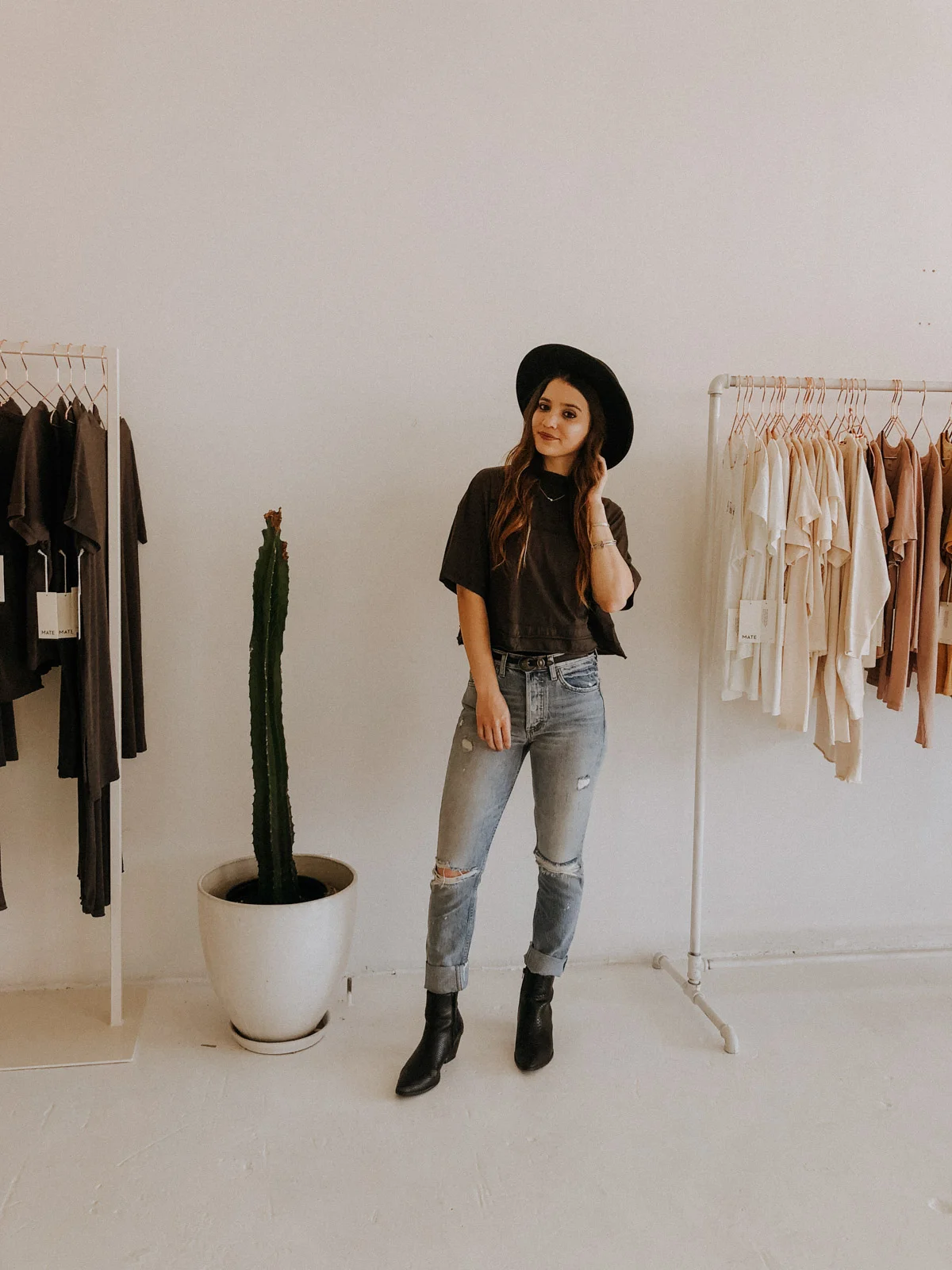 Taken at MATE the Label Headquarters. Wearing vegan hat, MATE the Label organic cotton tee, thrifted vegan belt from Poshmark, Boyish by Her jeans made from 30% recycled denim and 70% BCI cotton (Better Cotton Initiative) designed by one of my best friends Nicole Azevedo, and vegan Coconuts by Matisse x Free People booties.