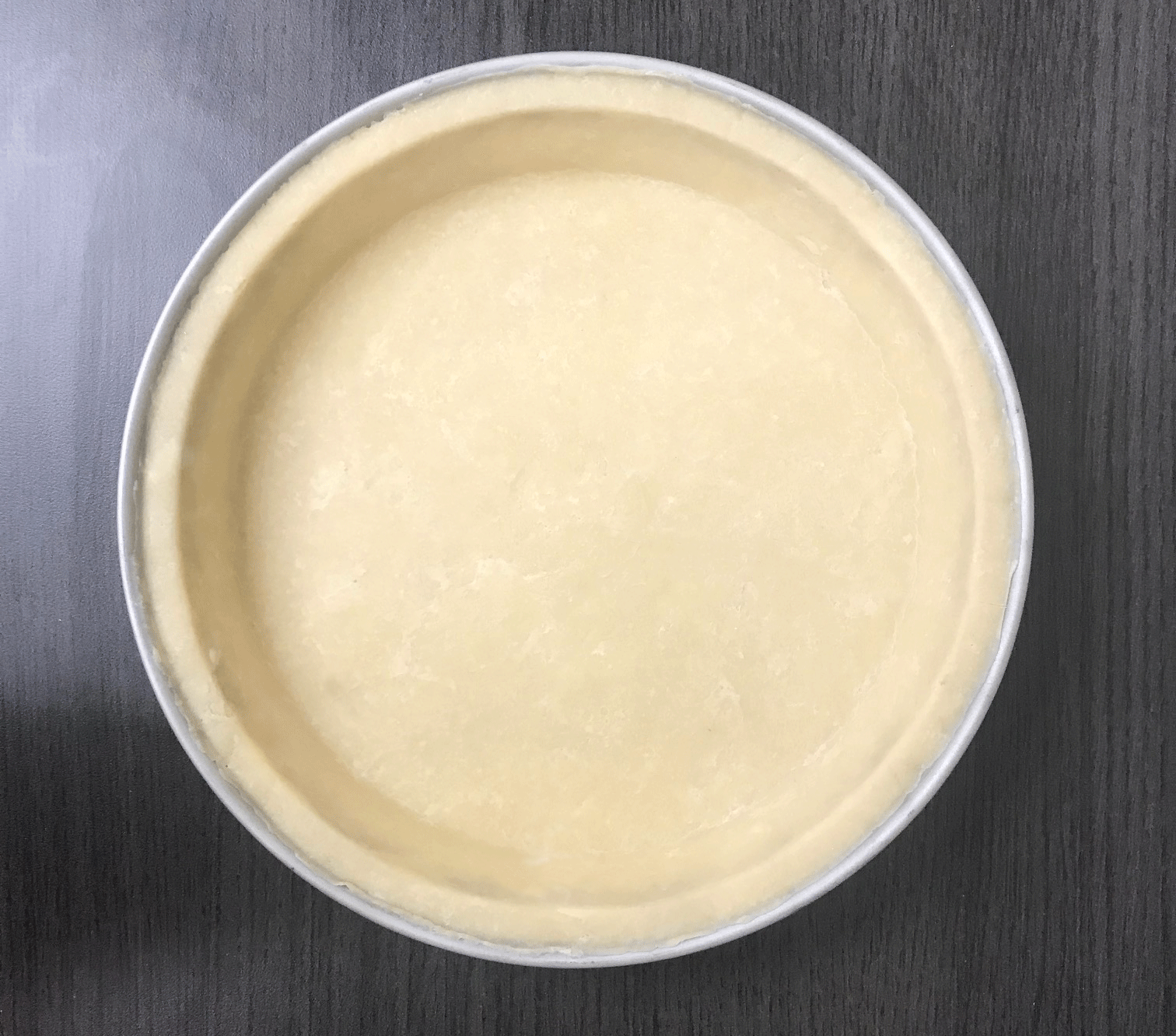 deep dish pizza crust pressed on Angel Dough Press