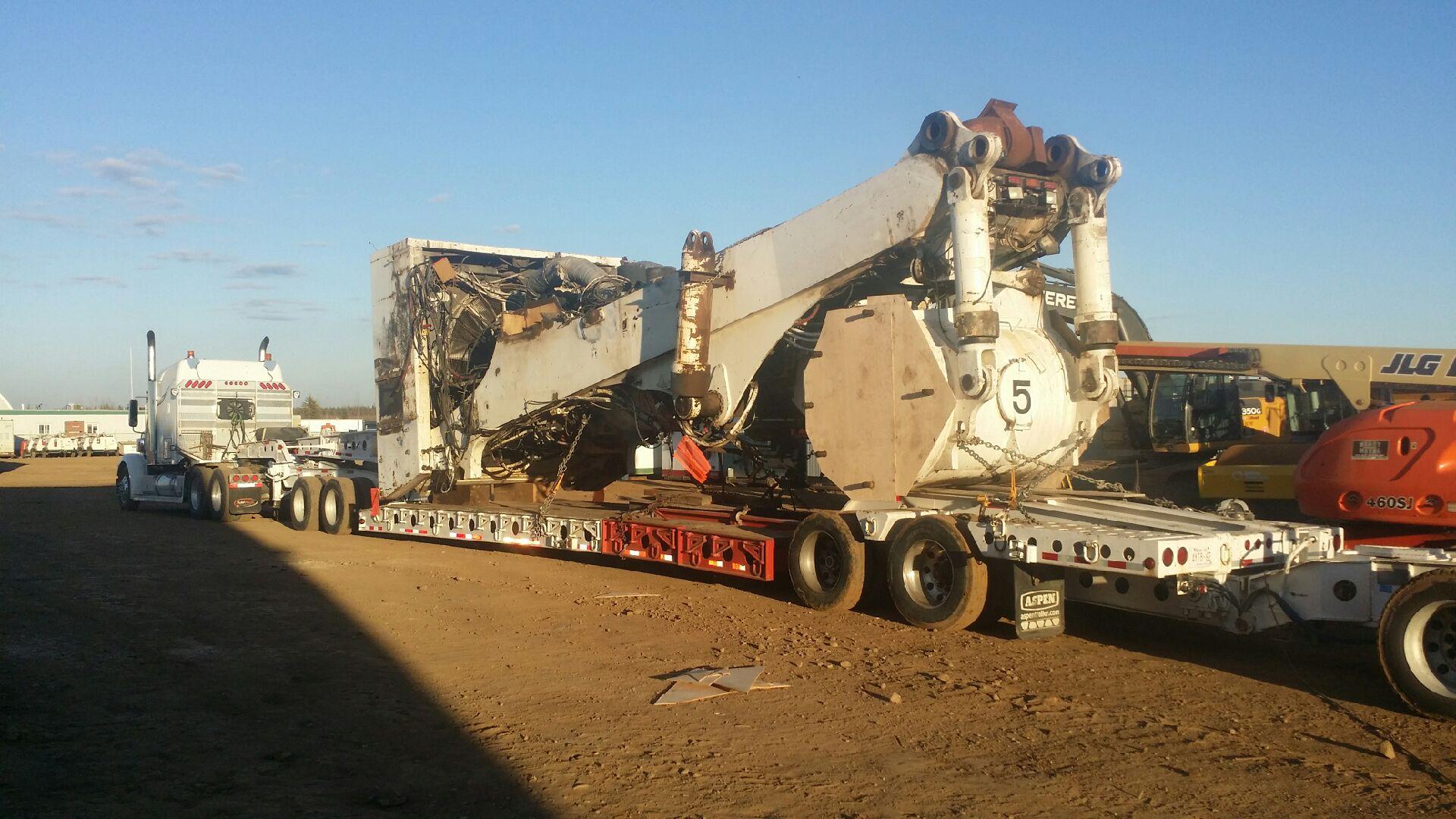   106,000 pound "Dump Truck Chassis" from Ft. McMurray, AB to the Port of Houston, TX for export.  