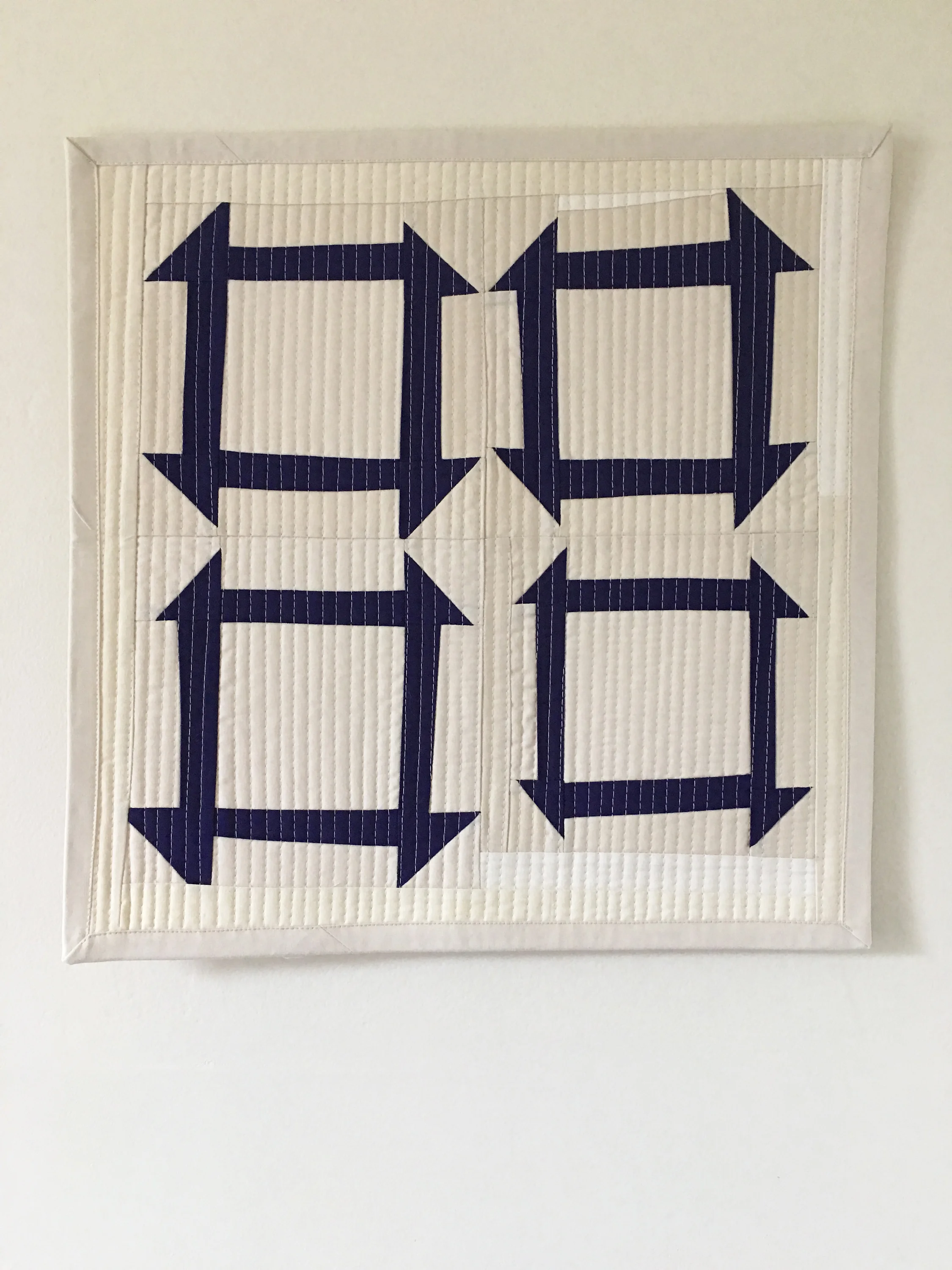   Improv Churn Dash  cotton fabric, thread, and batting 18” x 18” 2016 