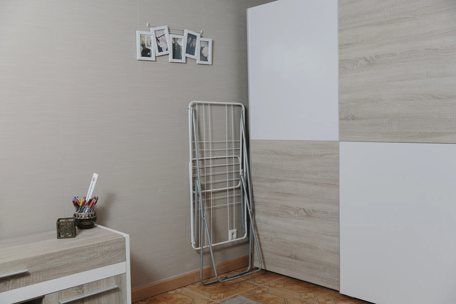 Yusuf's old room, wiped clean of any personal items.