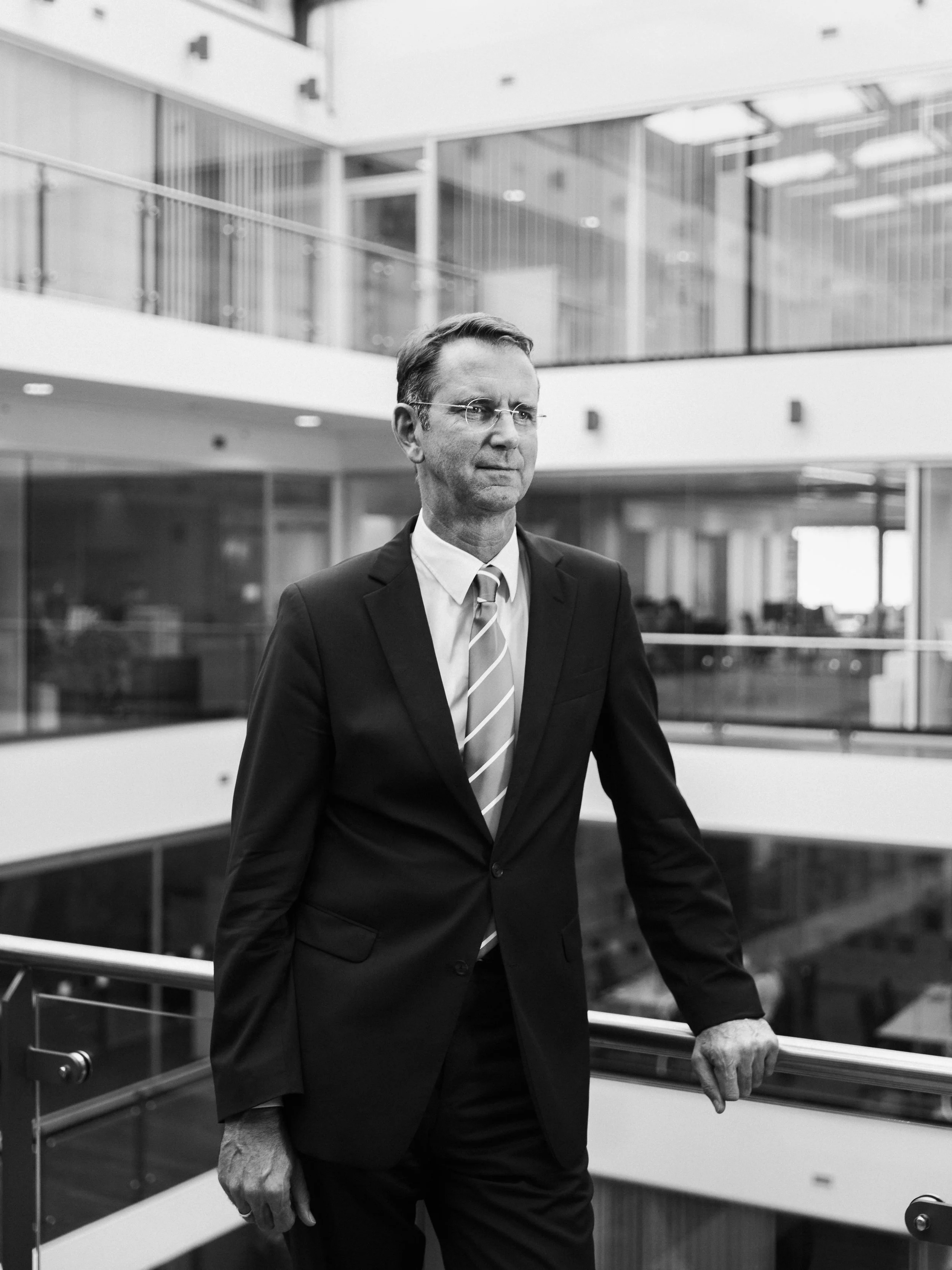 Prof. Dr. Günther Schuh in the atrium of the Clusters Smart Logistic building, at the RWTH Aachen.
