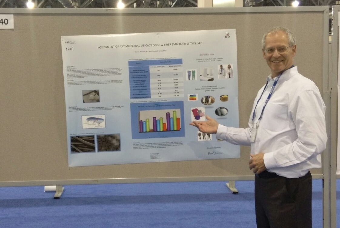 Dr. Greenfield at IDWeek 2014 by the poster bearing Dr. Gerba's results. (We got it straightened out after taking this shot...)