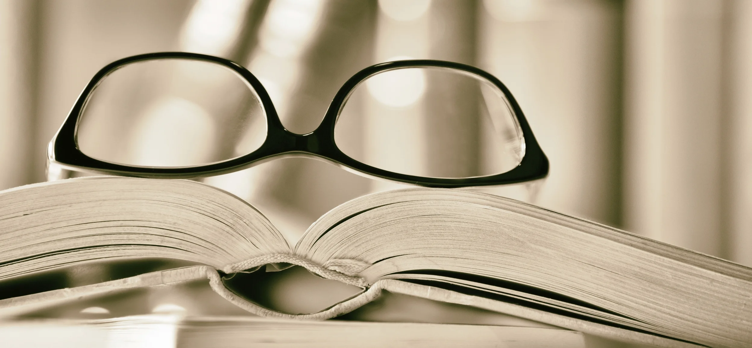 iStock_000070118481_Library books glasses.jpg