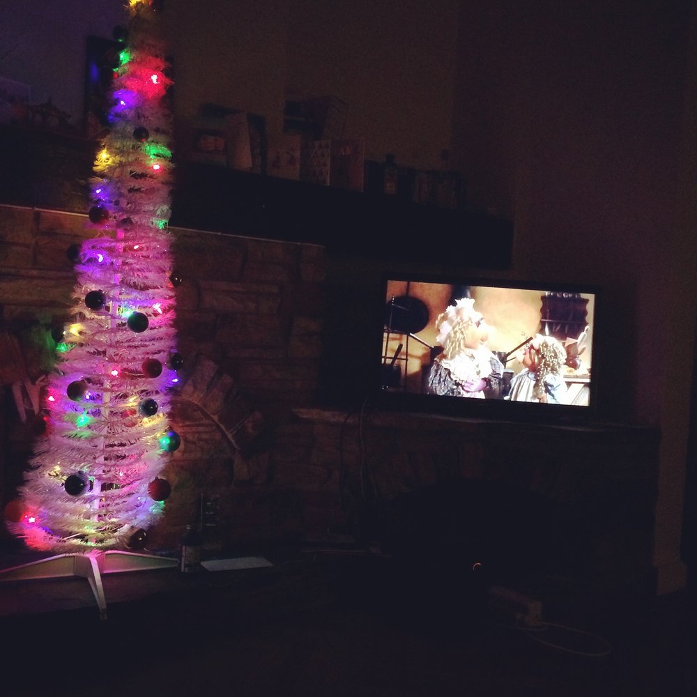 Watching a Muppet Christmas Carol next to a "Tree"