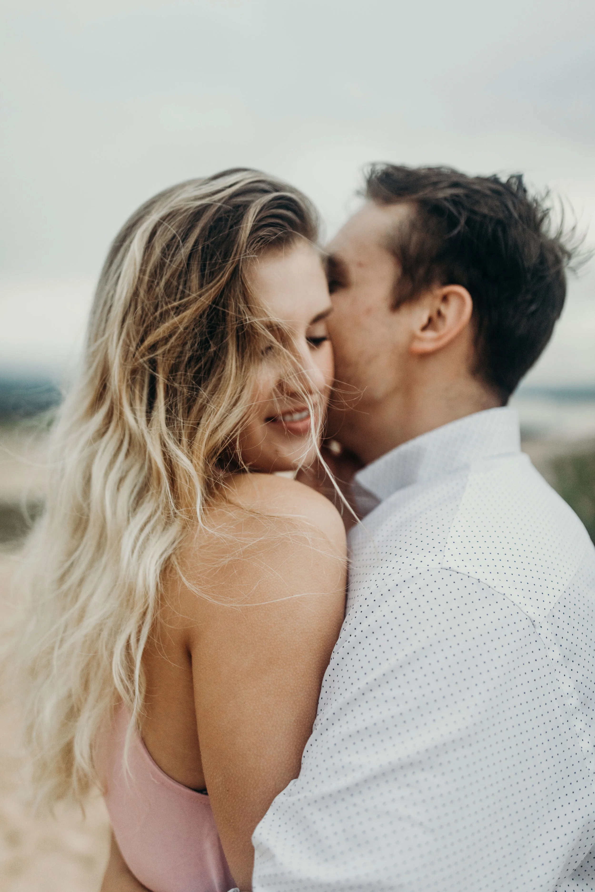 SleepingBearDunes_CouplesAdventureSession_AdventureWeddingPhotographer_HikingwithHeels_Brett+Emily-296.jpg