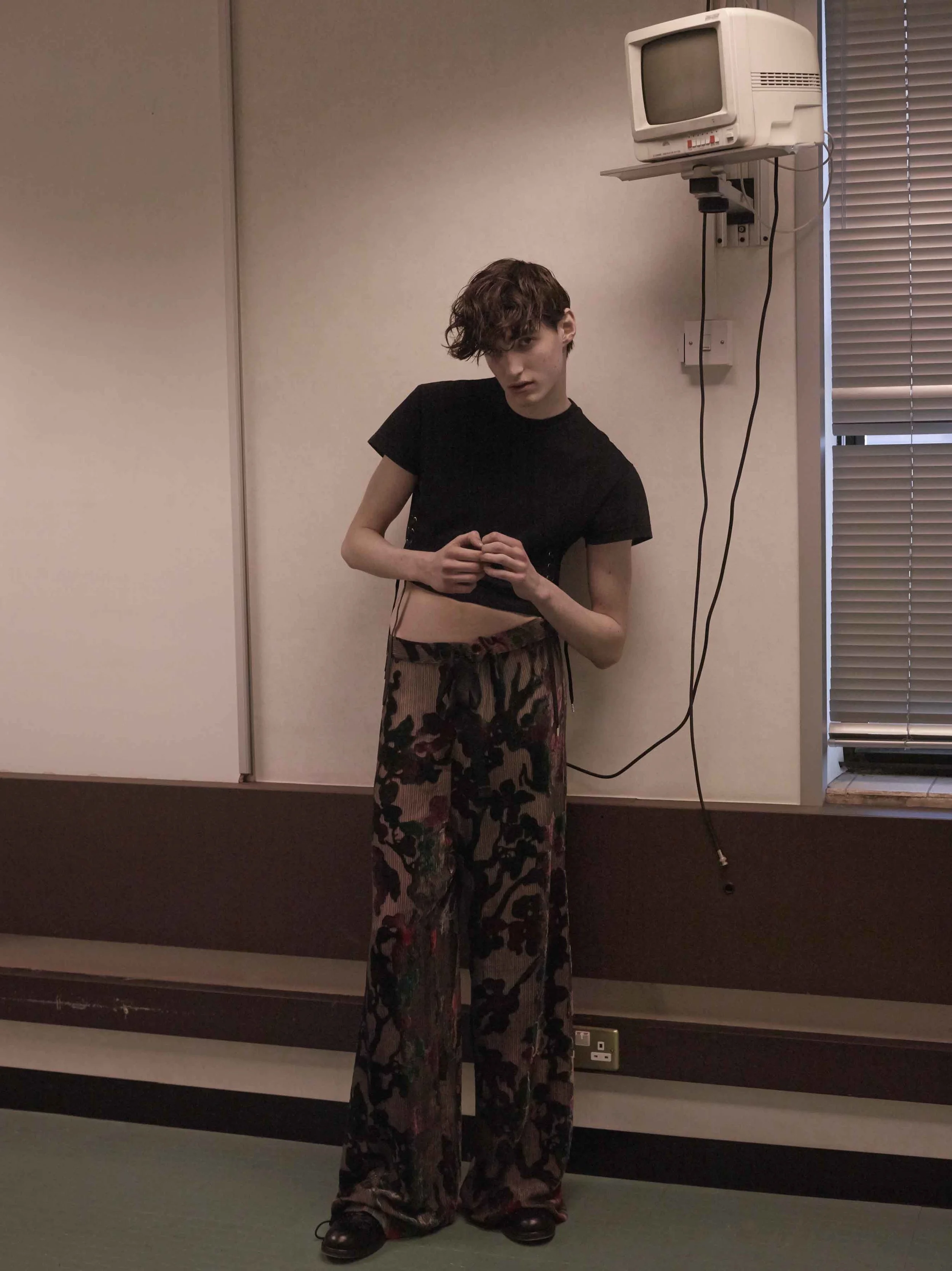 Top by Toga Trousers by Ed Lee Shoes by Christian Lacroix