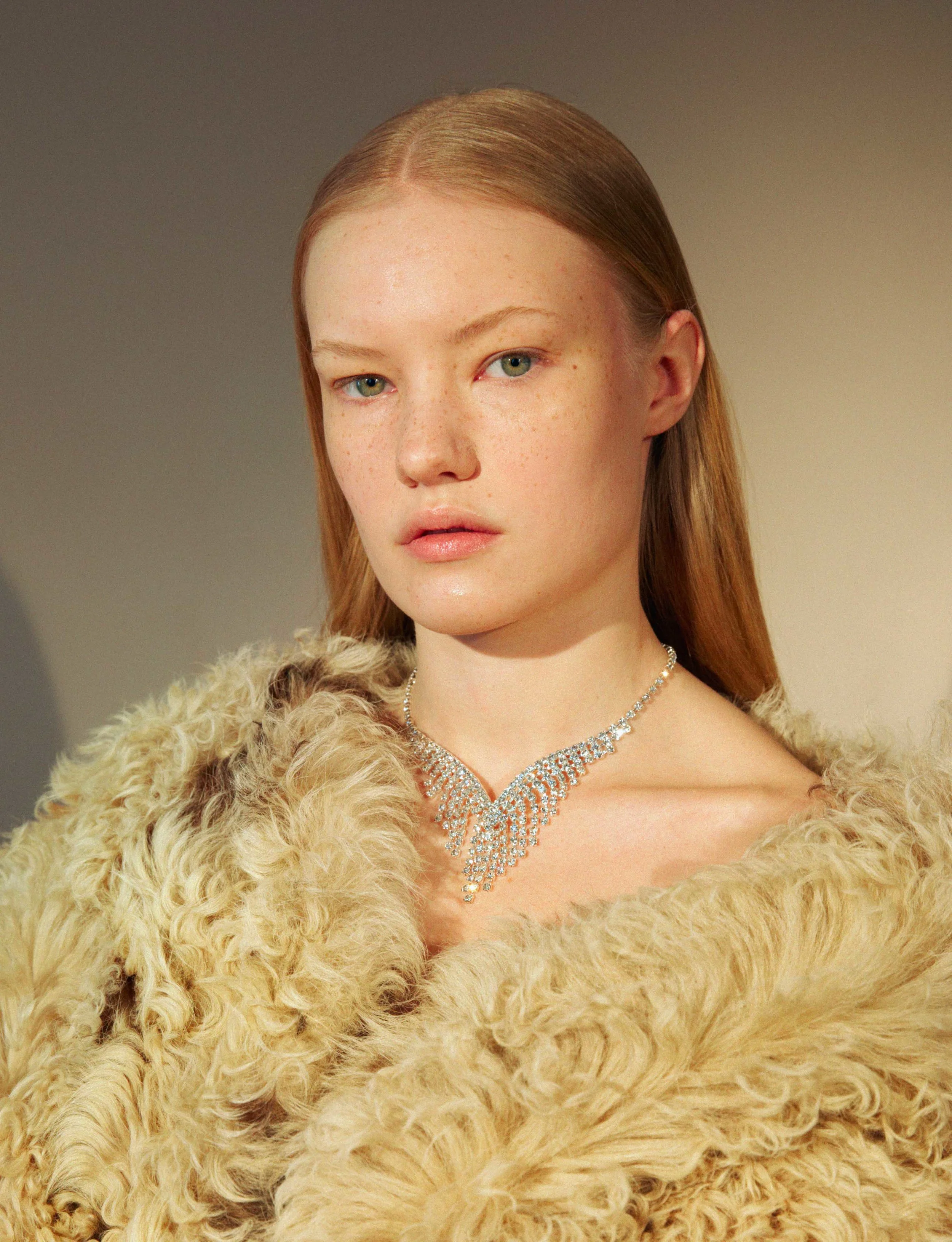 Coat by VEJAS Stylist’s own necklace