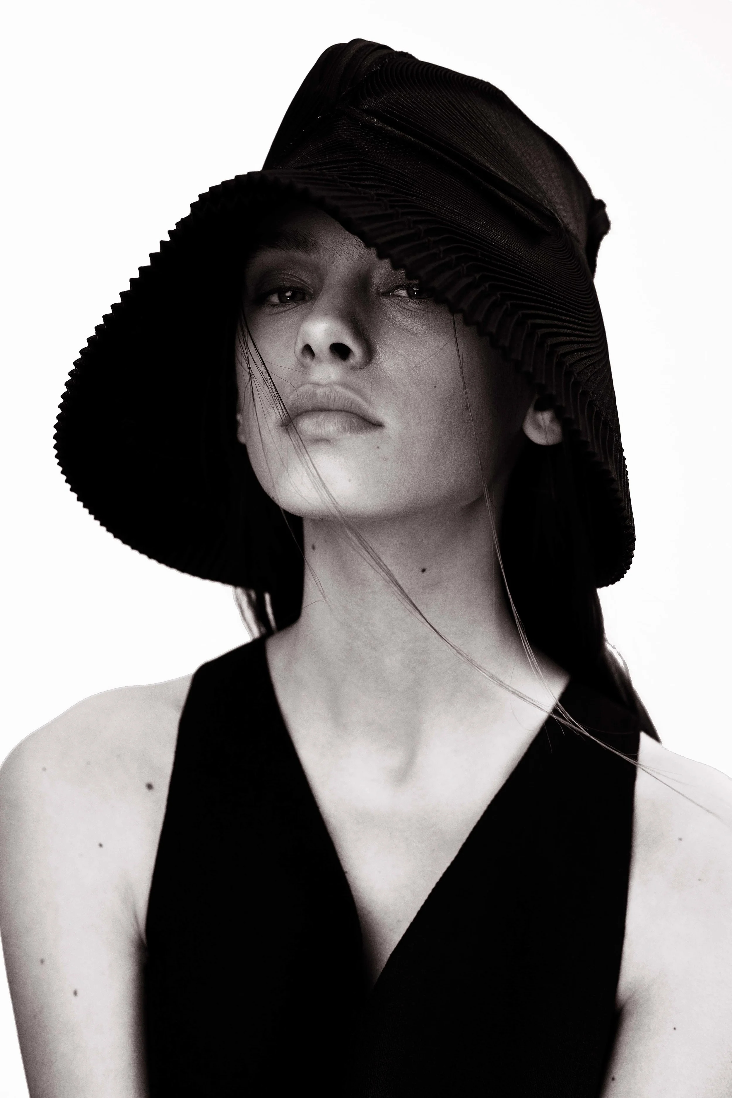 Hat by Issey Miyake Top by Whistles