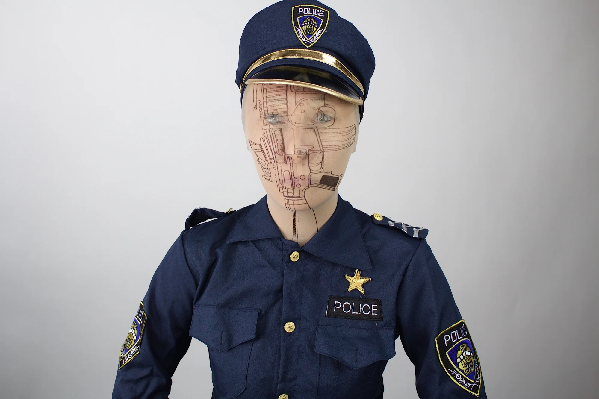 "I am against guns and all for gun control, especially in this recent climate of racially-spurred police brutality happening in the USA. I consider this a very poignant piece - a sign of the times."