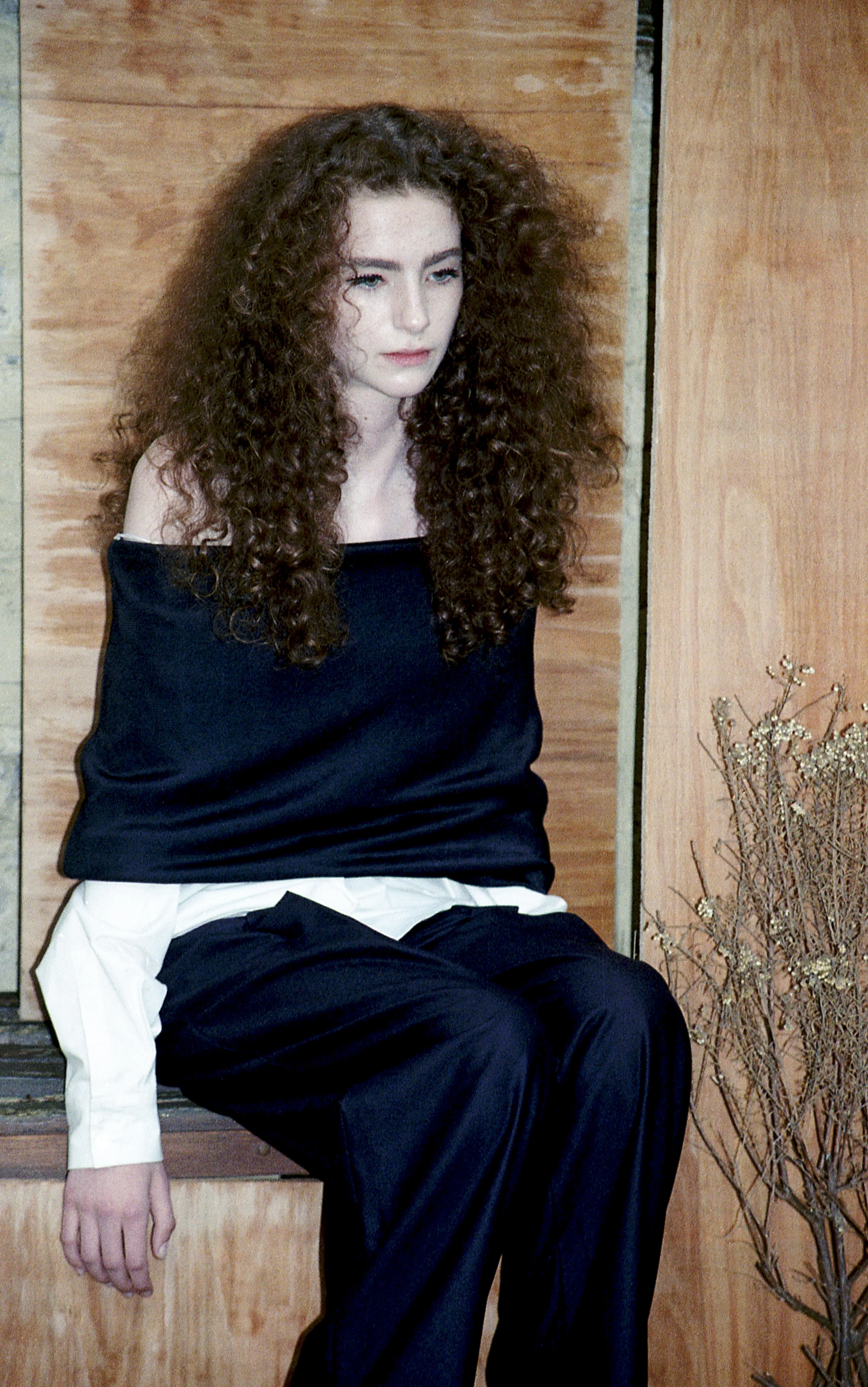 Isabella Wears Pleated Pants & Polo Shirt by Jacquemus
