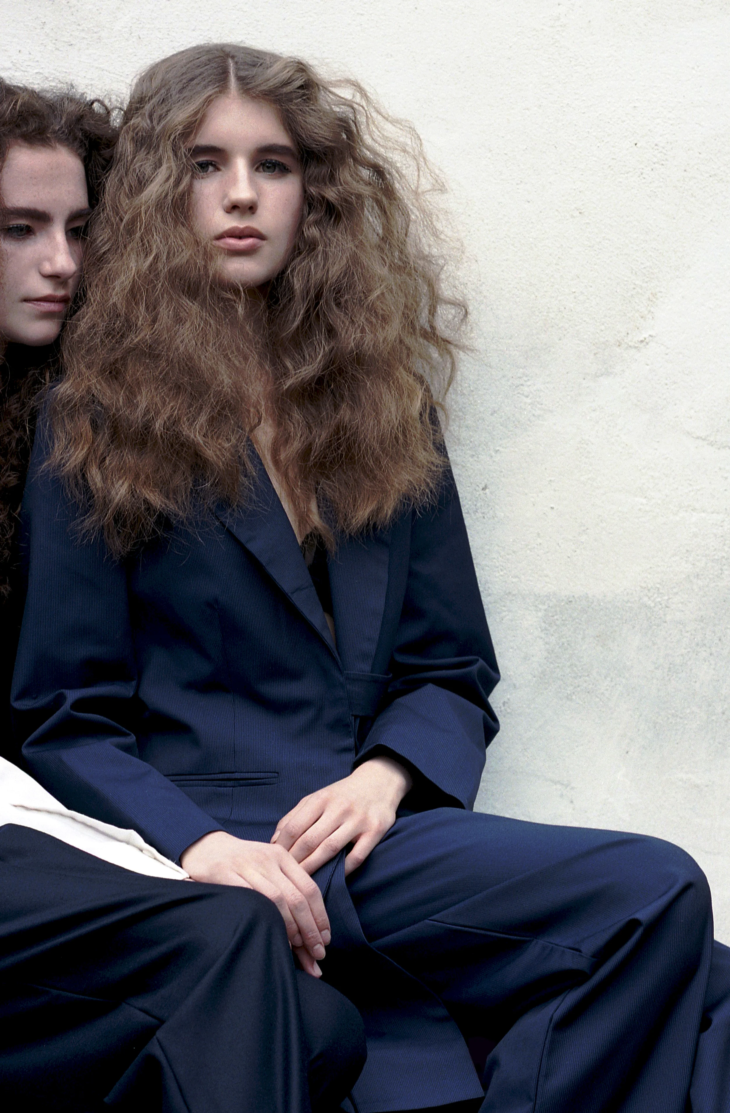 Isabella Wears Pleated Pants & Polo Shirt by Jacquemus, Socks by Falke, Flatform Shoes by Teva Sophie Wears Pyjama Pants & Pleated Jacket-Dress by Jacquemus, Bra by Eres, Socks by Falke, Flatform Shoes by Teva