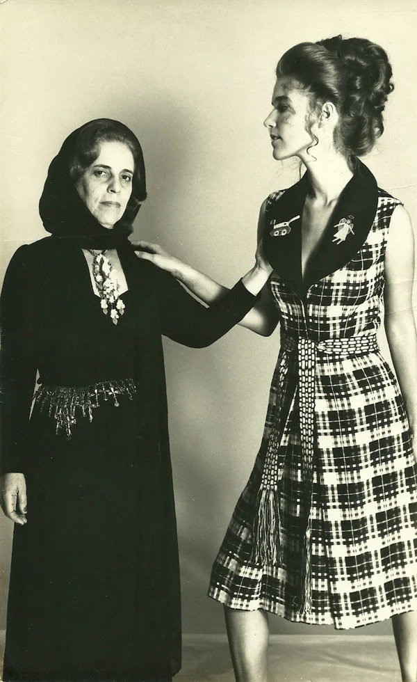 Zuzu Angel (left) in all black after her son’s death. To her right, a model wearing a dress from Zuzu’s “Helpless Angel” collection.