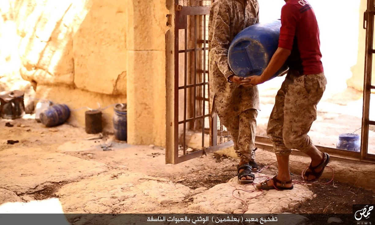 Images published by Isis claim to show two men carrying explosives into Baal Shamin. Photo by ISIS /Homs region.