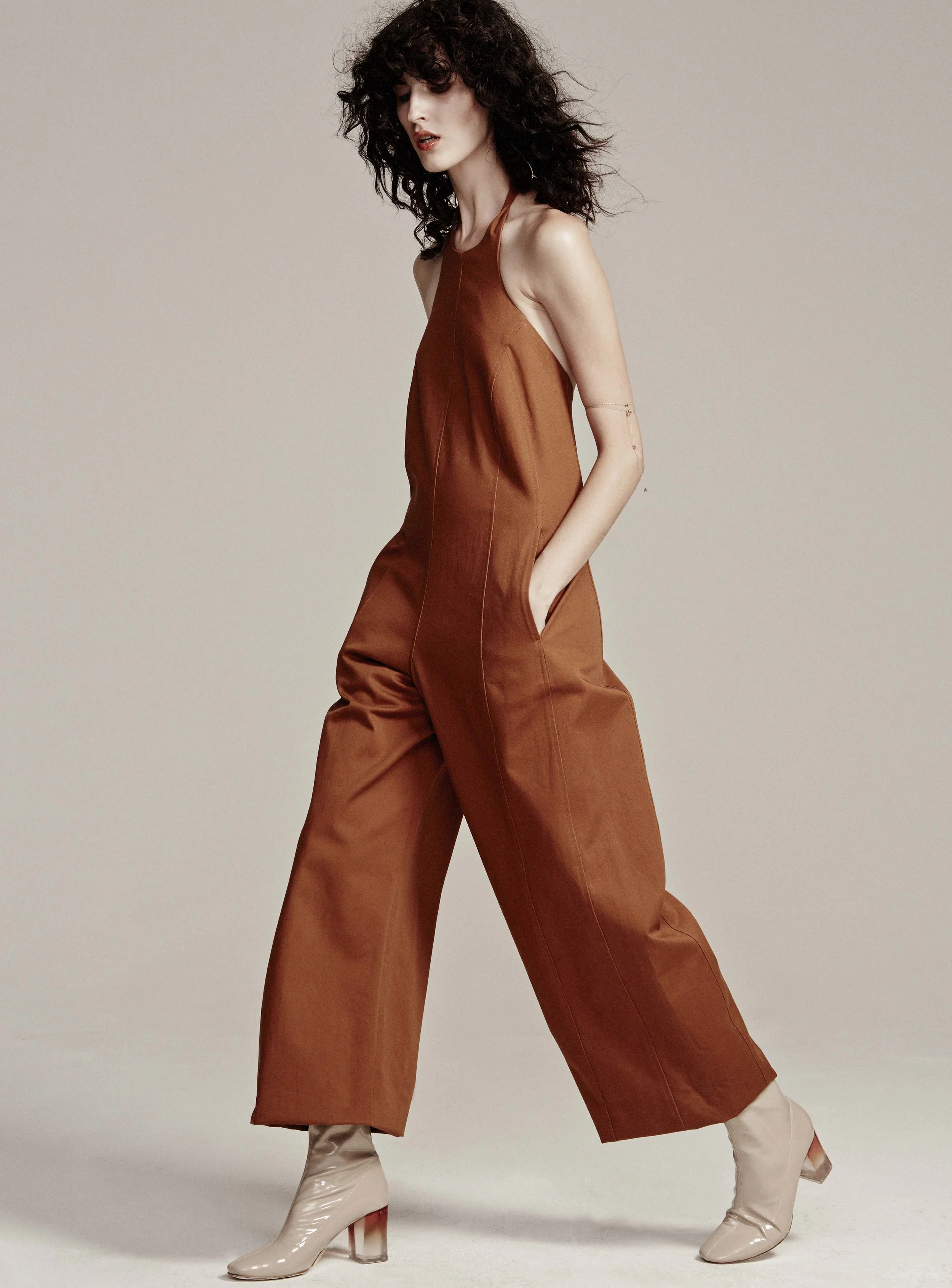 Jumpsuit by Maryam Nassir Zadeh, Earring , Rings and Necklace (worn around arm) by Lorae Russo, Stylist's own Boots