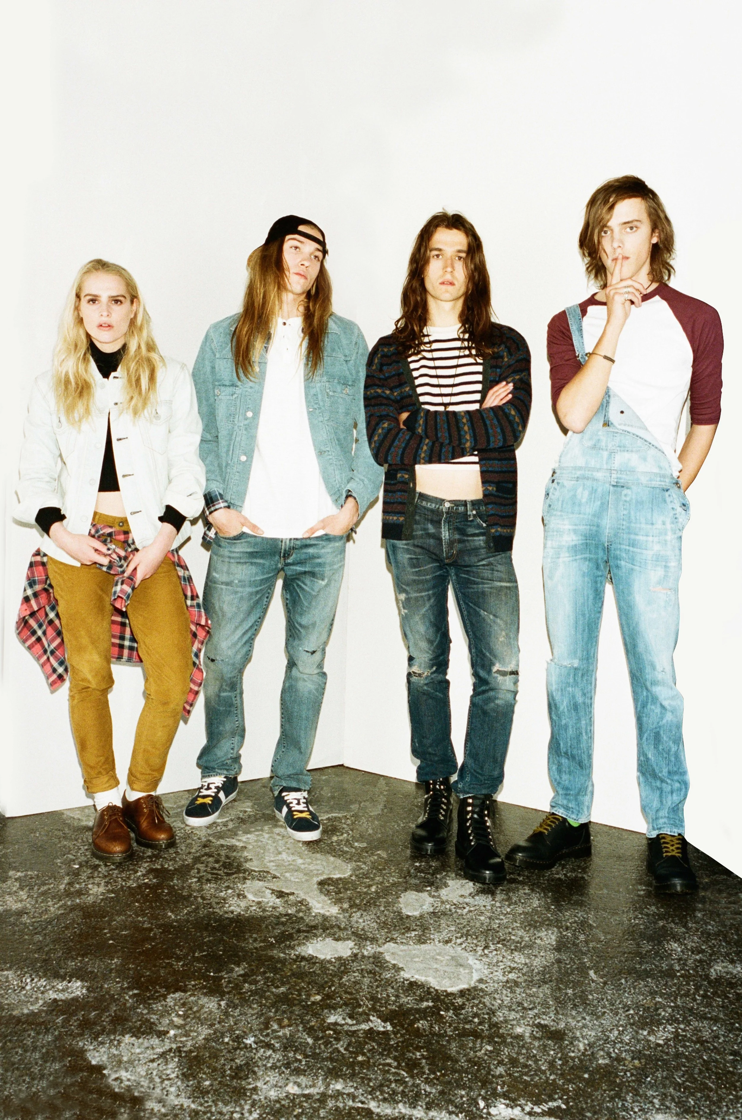 Arabella wears Black Crop Polo Top by Citizens of Humanity, Denim Jacket by Levi’s, Red Checked Shirt by Levi’s, Mustard Corduroy Trousers by Levi’s, Brown Shoes by Dr Martens. Emil wears White T-shirt from Beyond Retro, Check Shirt by Penguin, Blue Corduroy Jacket by Citizens of Humanity, Ripped Jeans by Citizens of Humanity, Trainers by Timberland, Black Cap - Stylist’s Own. Tommy wears Striped Crop Jumper by Levi’s, Brown Patterned Cardigan by Levi’s, Ripped Jeans by Citizens of Humanity, Black Boots by Dr Martens, Necklace - Model’s Own. Jack wears Baseball Top by American Apparel, Dungarees by Citizens of Humanity, Shoes by Dr Martens, All Jewellery - Model’s Own 