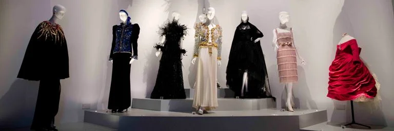 Haute couture including the 'Zephirine dress' (far right) designed by Yves Saint Laurent when working for Dior in 1958