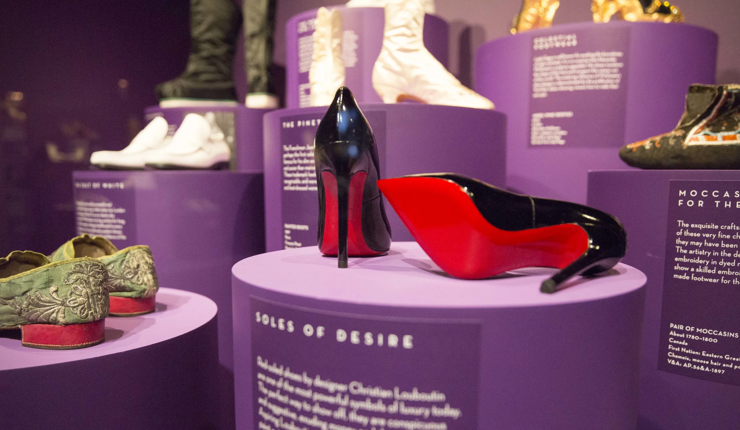 Christian Louboutin 'Pigalle' pump. Installation view of Shoes: Pleasure and Pain
