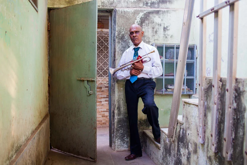 ' The Business of Death ' featured in ' Bandra ' Motherland Issue #14. Bandmaster Joe Vessaokar, p hoto by Karen Dias