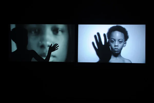 Still from a video installation 'Crocodiles Lurk in Quiet Ponds’ by Marcel Odenbach.