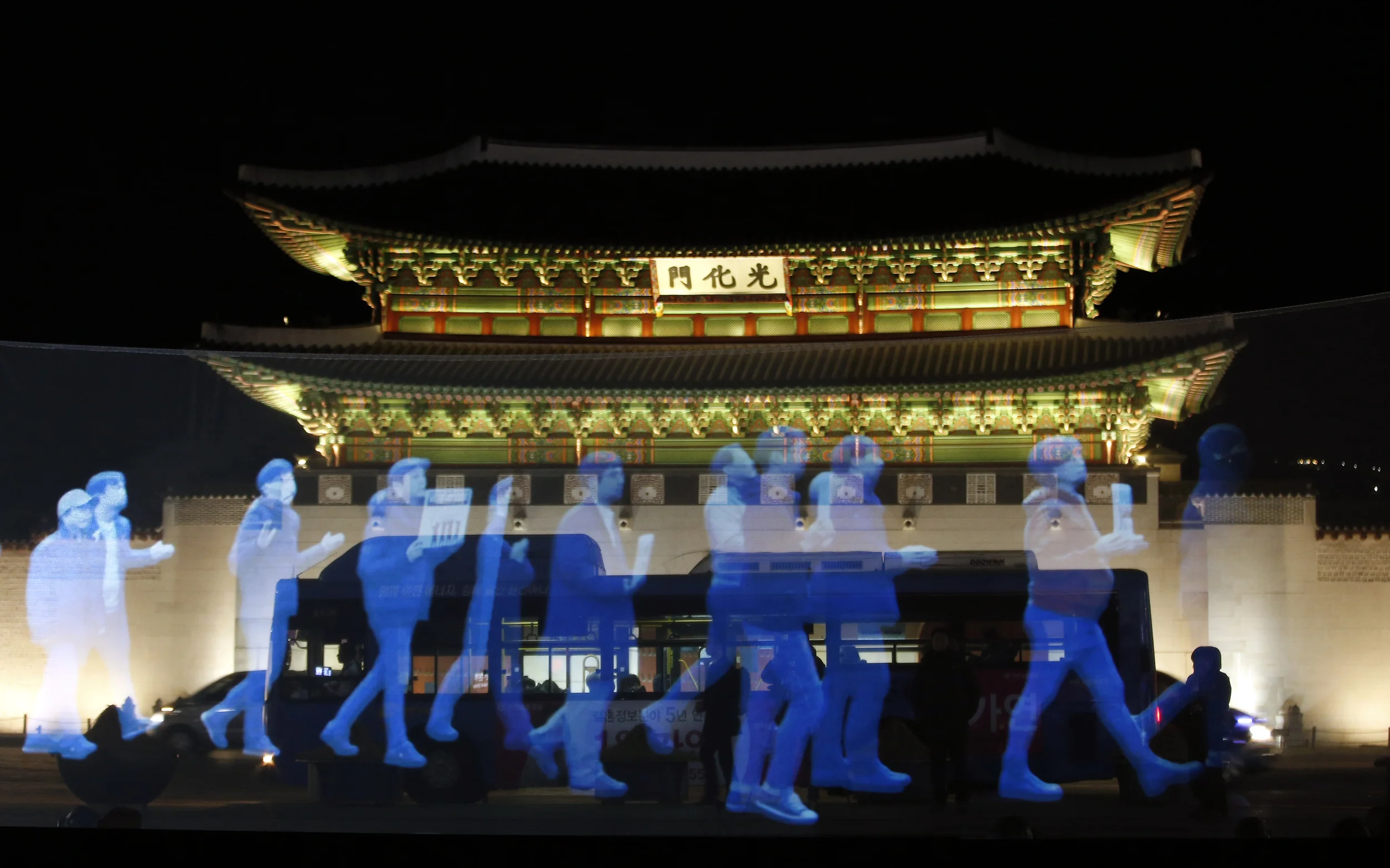A holographic "ghost protest" held in South Korean capital Seoul against the erosion of free speech in the country. Photo by Associate Press, February 2016.
