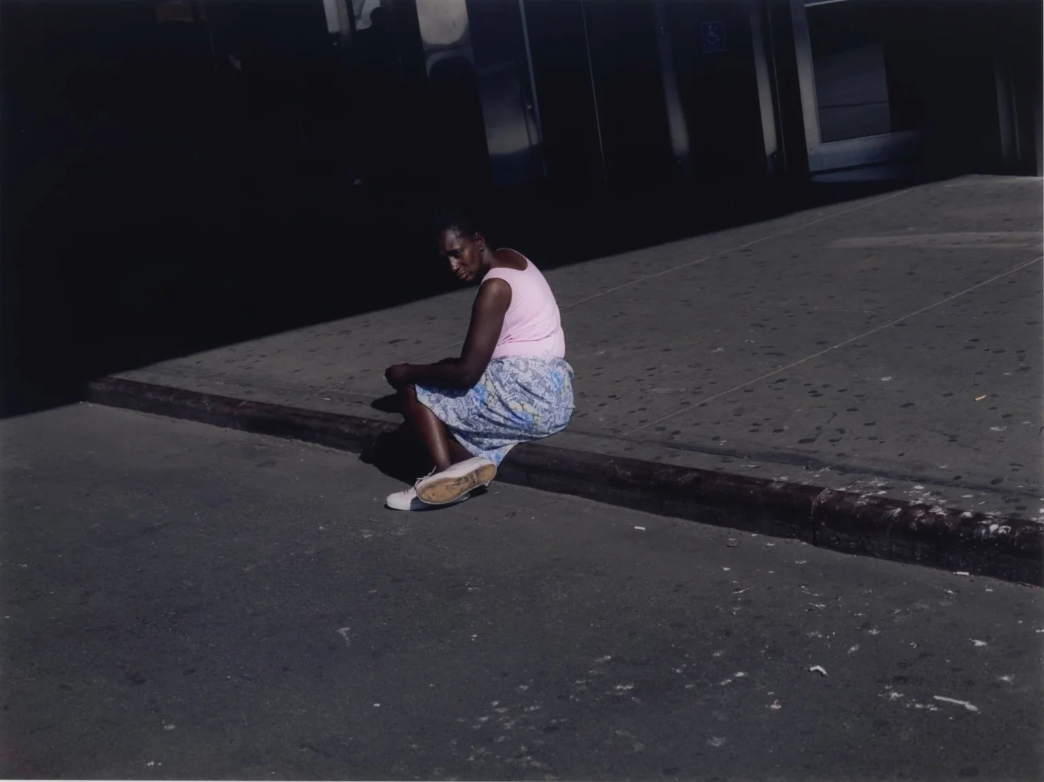 Woman on Sidewalk , New York, 2002 by Paul Graham.