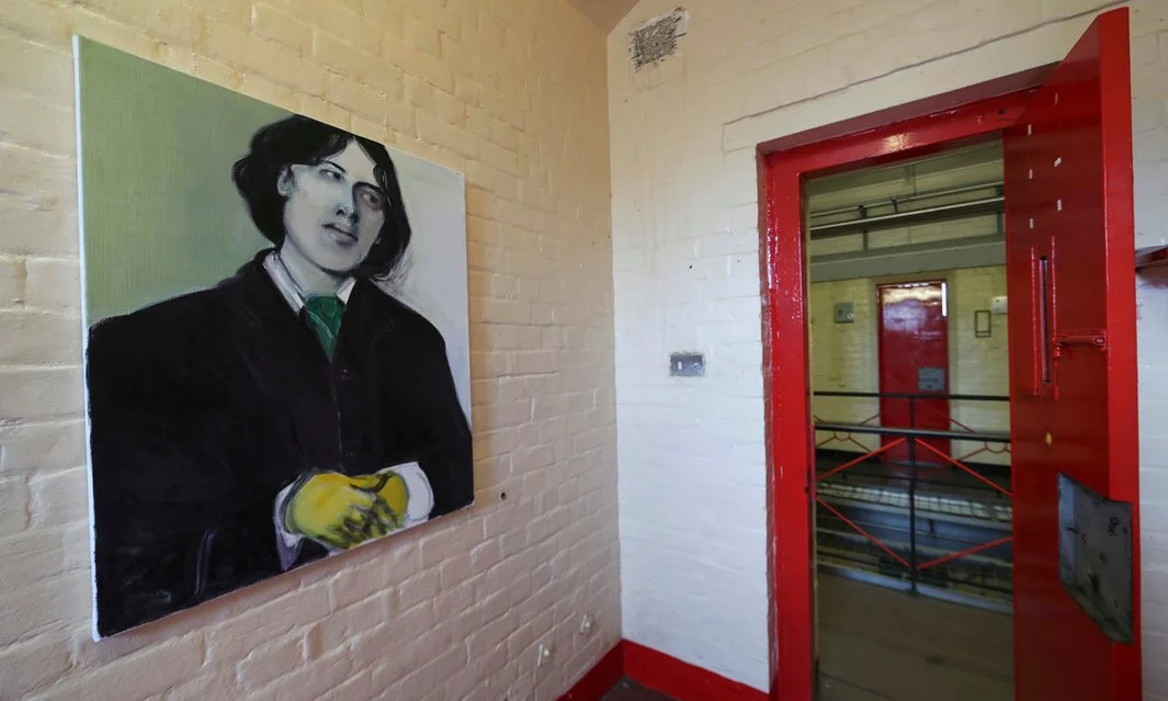One of a Thousand Lifeless Numbers , 2012 by Marlene Dumas. A portrait of Oscar Wilde at the HM Prison Reading exhibition. Photo by Eddie Keogh at Reuters .
