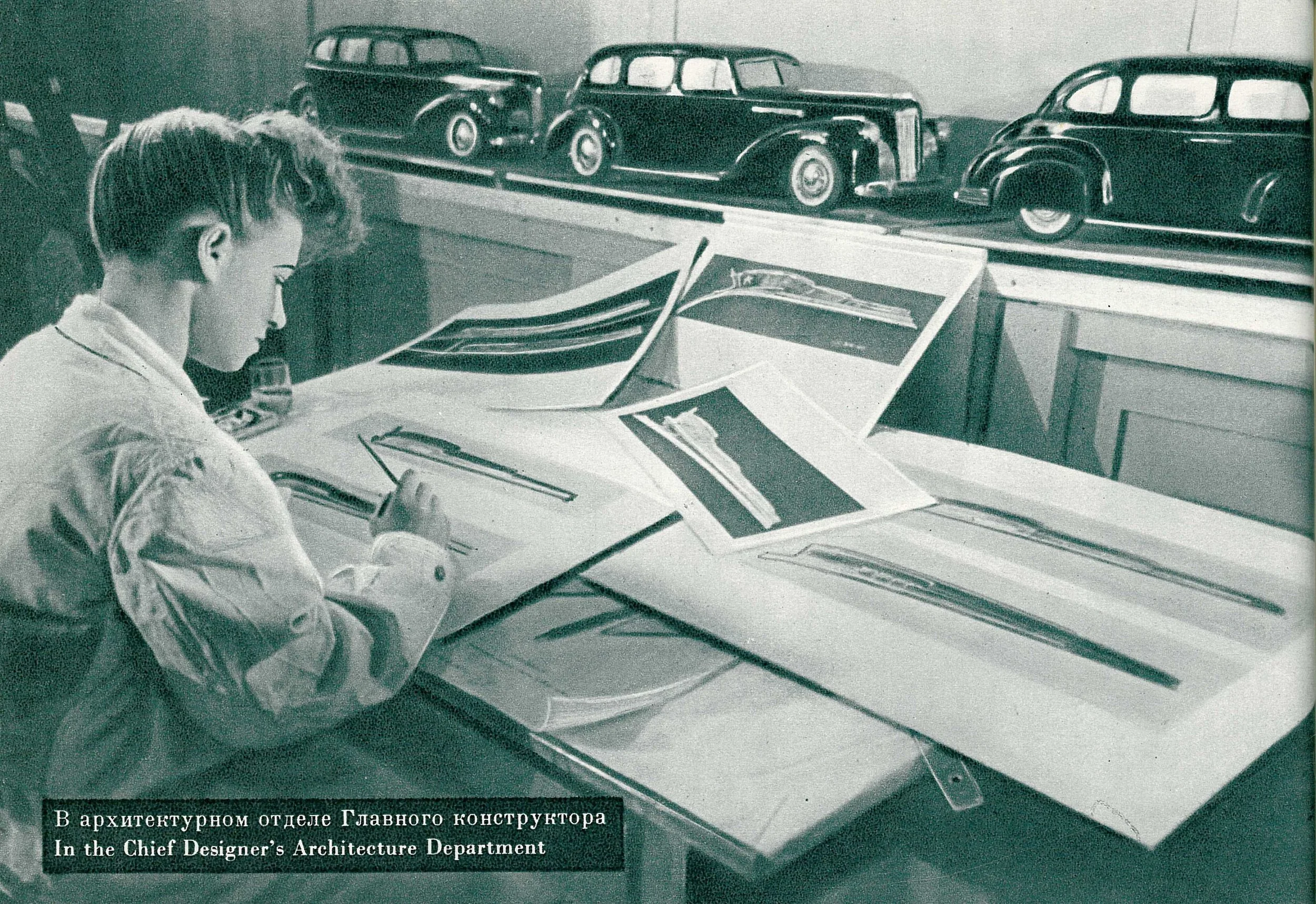 A woman from the design department in 1956 sketching out designs for the hood ornament which was a stylised version of the Soviet flag.