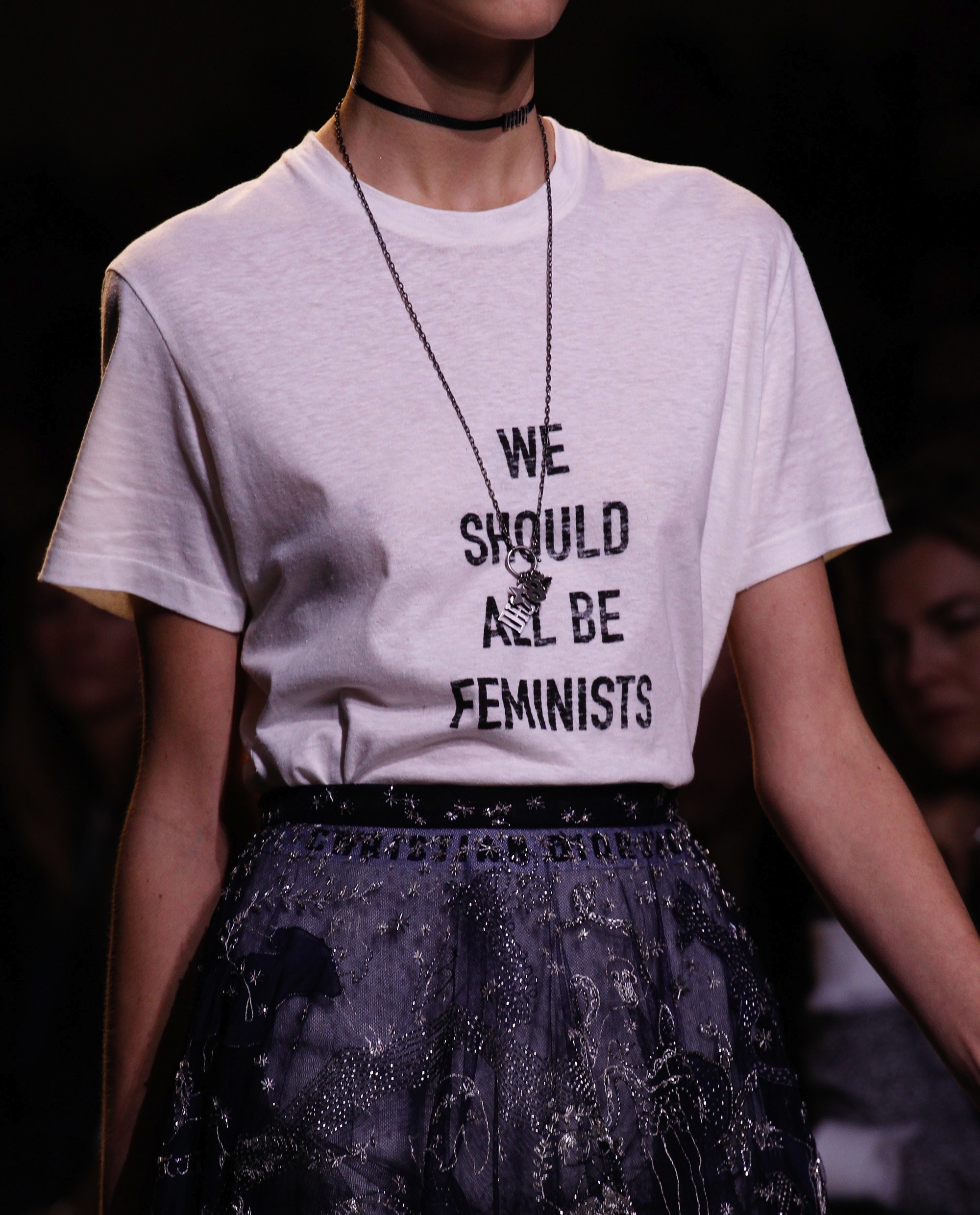 A t-shirt with the words " We Should All Be Feminists " by Maria Grazia Chiuri for Christian Dior's SS17 collection. Photo source: Vogue Runway.
