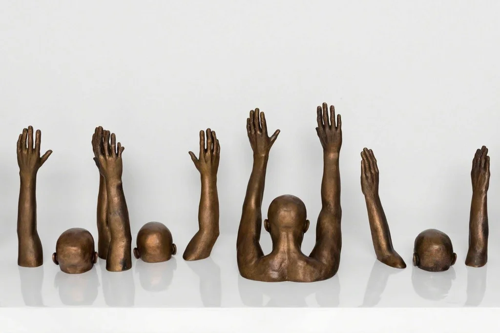 Raise Up , 2014 by Hank Willis Thomas.