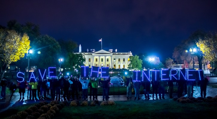 Demonstrators protest in front of the White House in support of Net Neutrality. Photo source: Getty Image, 2014.