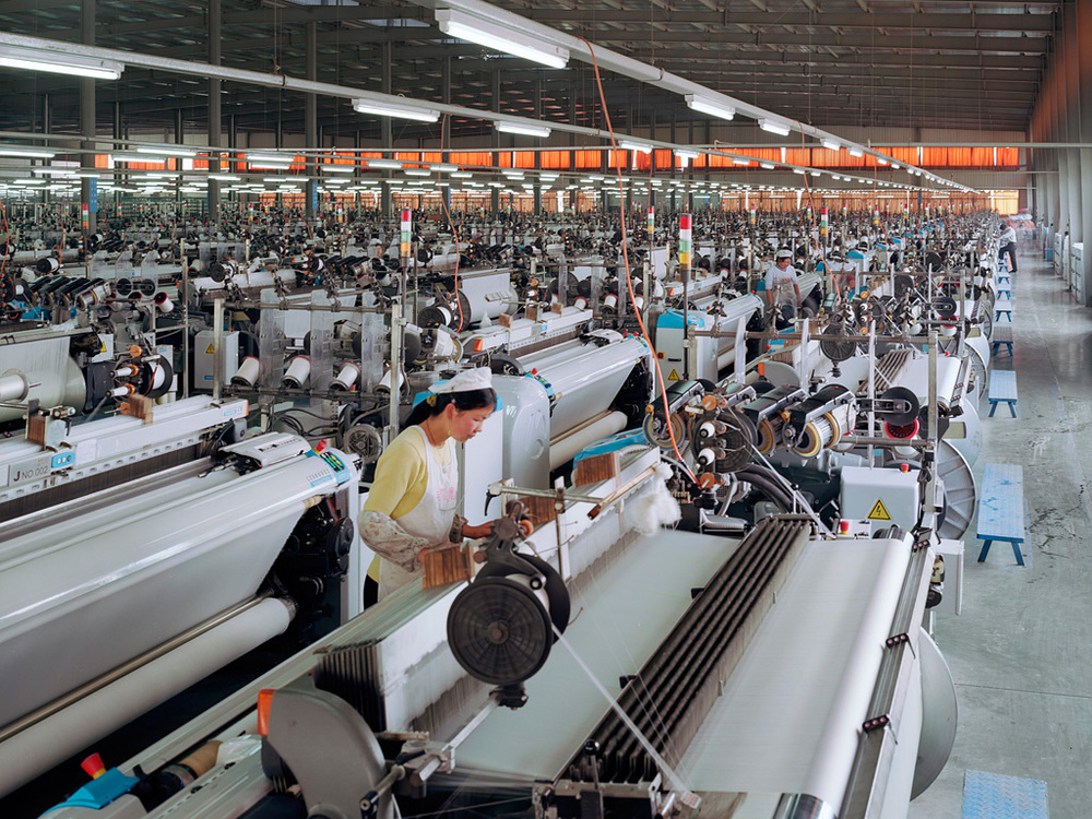 Manufacturing #7, Textile Mill, Xiaoxing, Zhejiang Province, 2004 by Edward Burtynsky.