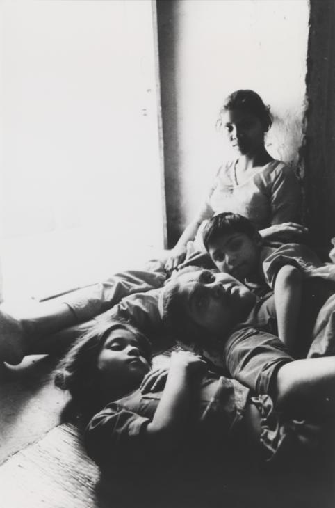 Shanti with children, Dakshinpuri, Delhi , 1989 by Sheba Chhachhi.