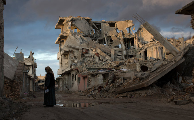 Ten months after coalition airstrikes. Kobani, Syria. Photo by Cre Tyler Hicks for The New York Times .