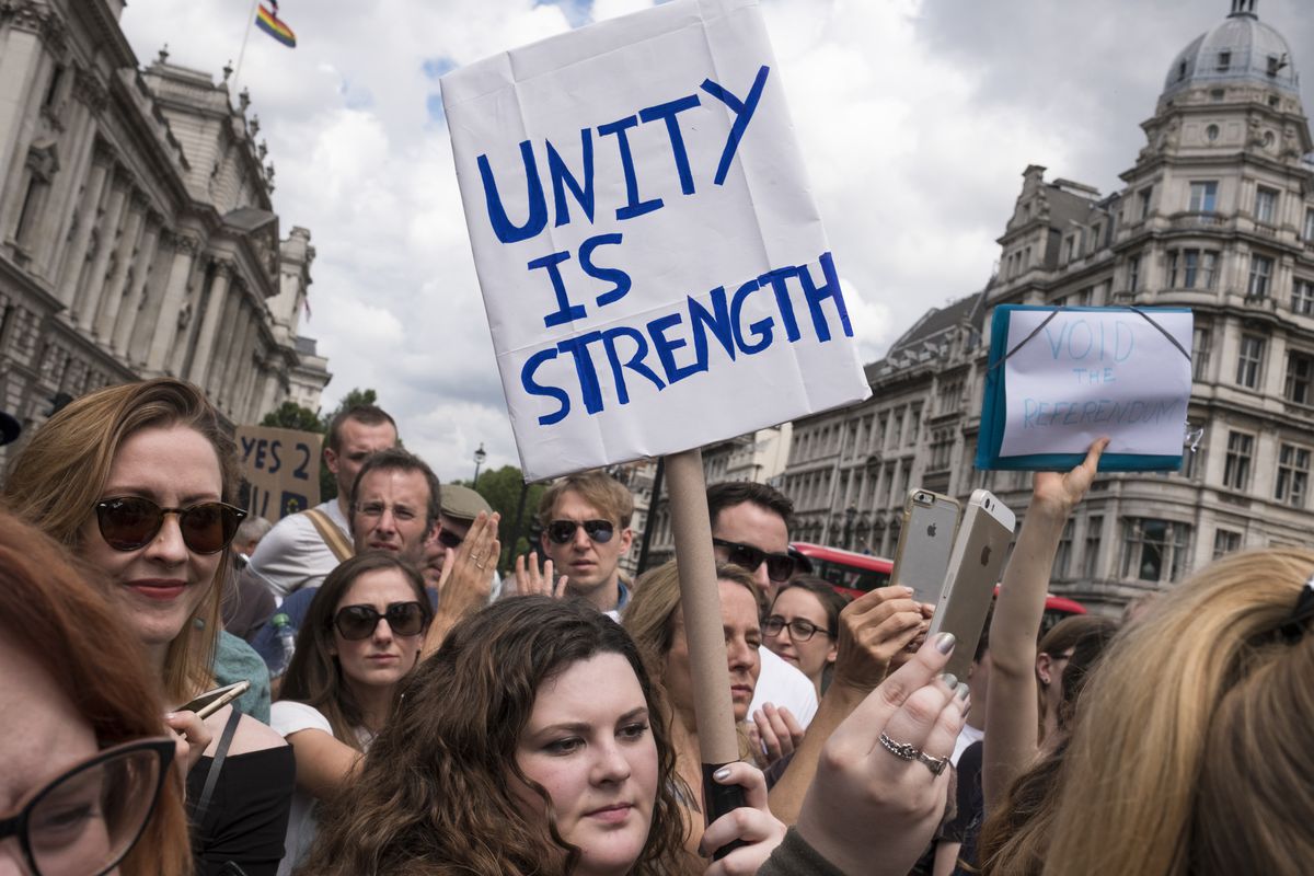 Anti-Brexit protesters demonstrate in Parliament Square in London. Photo by Adam Ferguson for The New York Times .
