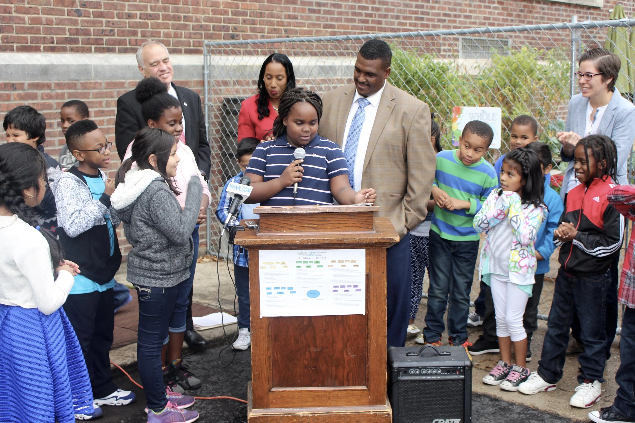 A 4th grader at Clinton School talks about building the school garden at the Comptroller's press conference.