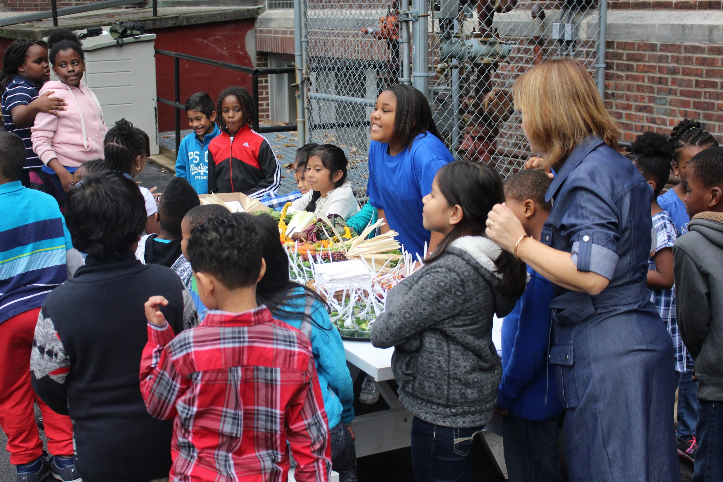 Clinton students get ready to sample some locally-grown snacks.