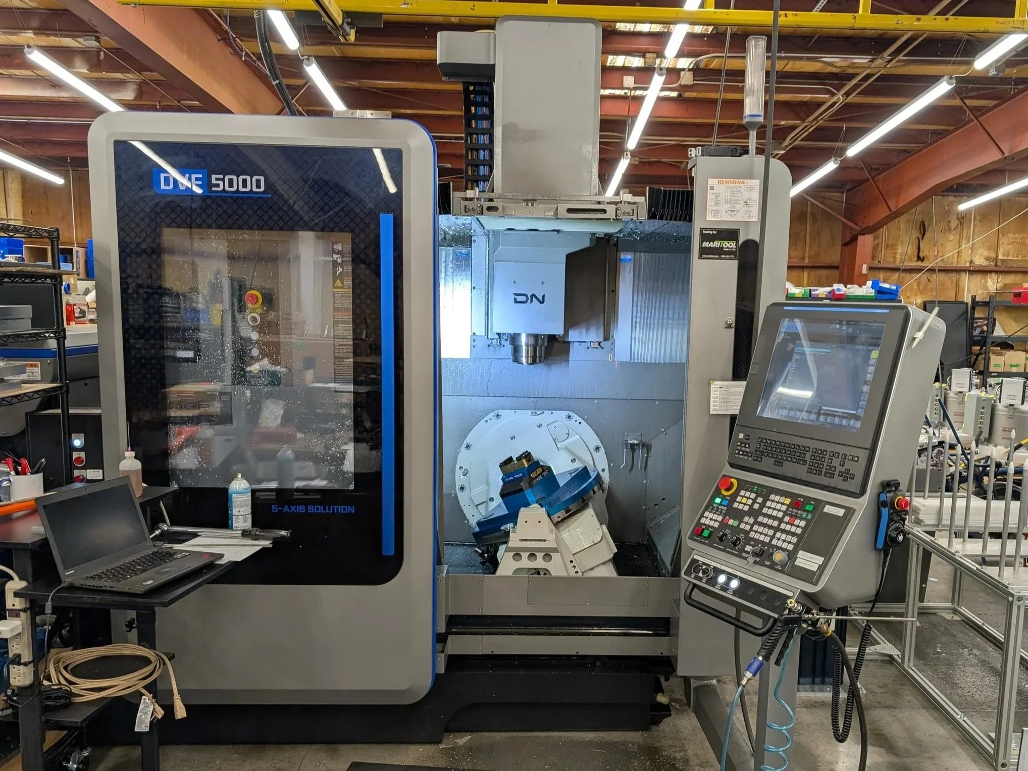 2025 Doosan DVF 5000 5-axis milling machine with robot loader