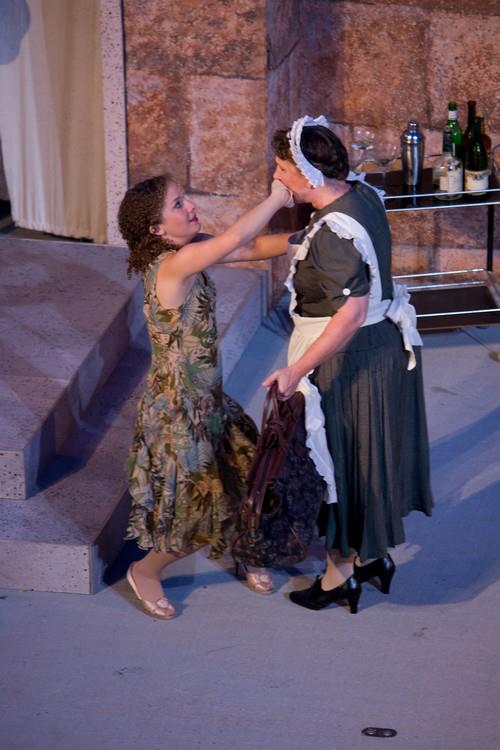  Julia hastily hushes Lucetta in Two Gentlemen of Verona at Oklahoma Sheakespeare in the Park. Directed by Kathryn McGill, Scenic Design by Rick Reeves, Costumes by Robert Pittenridge. 