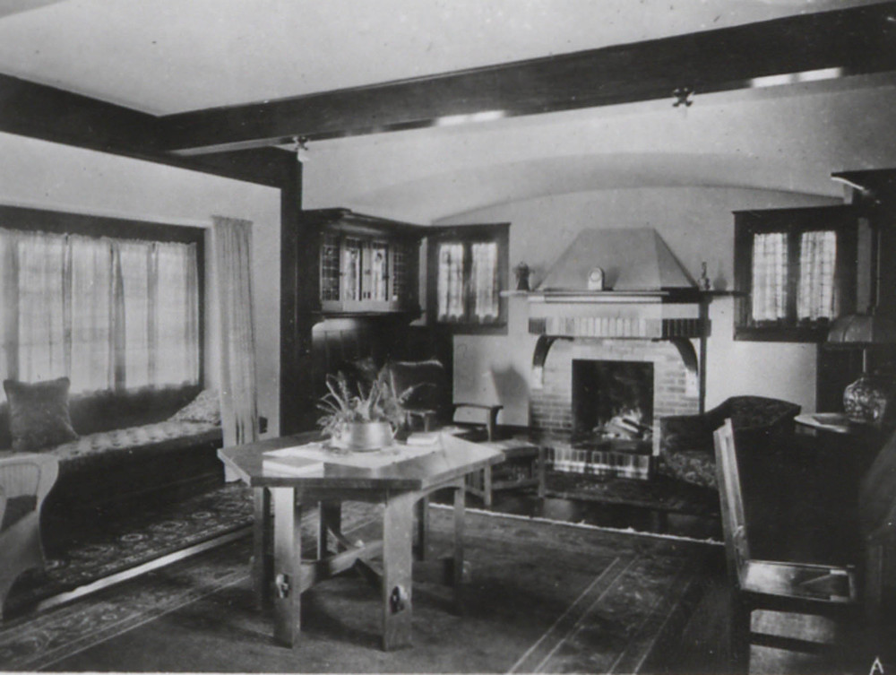 Above, a window seat with a box cushion can be seen in this vintage Arts & Crafts interior.