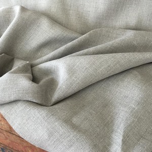 Irish Linen: the classic Arts & Crafts fabric, medium weight and excellent for all designs. In natural, a true taupe, at 54" wide. $24.00 per yard.
