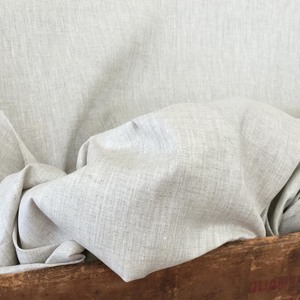 Handky Linen, Natural: a classic sheer, woven with a fine thread so that it can support applique or Roman shade structure. Should not be lined, 55" wide. $25.00 per yard.