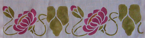 Water Lily Bord e r: With a repeat of 4 1/2 inches high x 9 1/2 inches wide. Shown in stock in rose, antique gold and loden. Looks like a chrysanthemum when done in dark red! A template is also available for this design. $45.00 per repeat