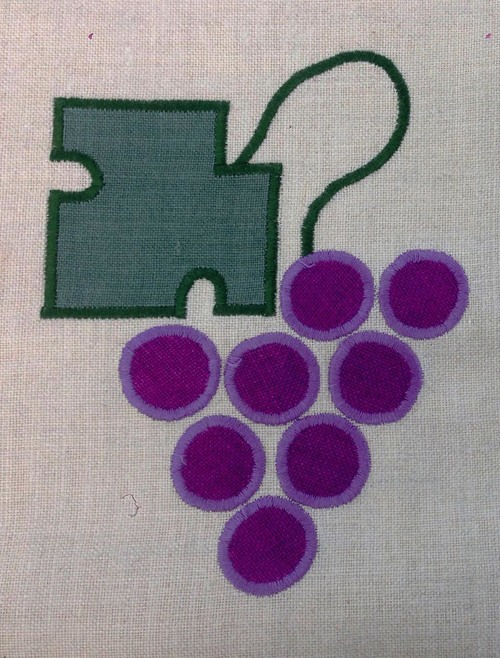 Bungalow Grape : Shown here in purple and forest, six inches high, $40.00 per motif