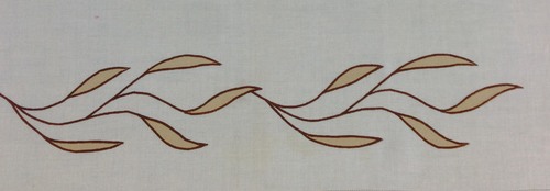 Willow Border small : 13" wide x 4 1/2" high. Shown here in antique gold with brown stitching. $36.00 per repeat of one branch.