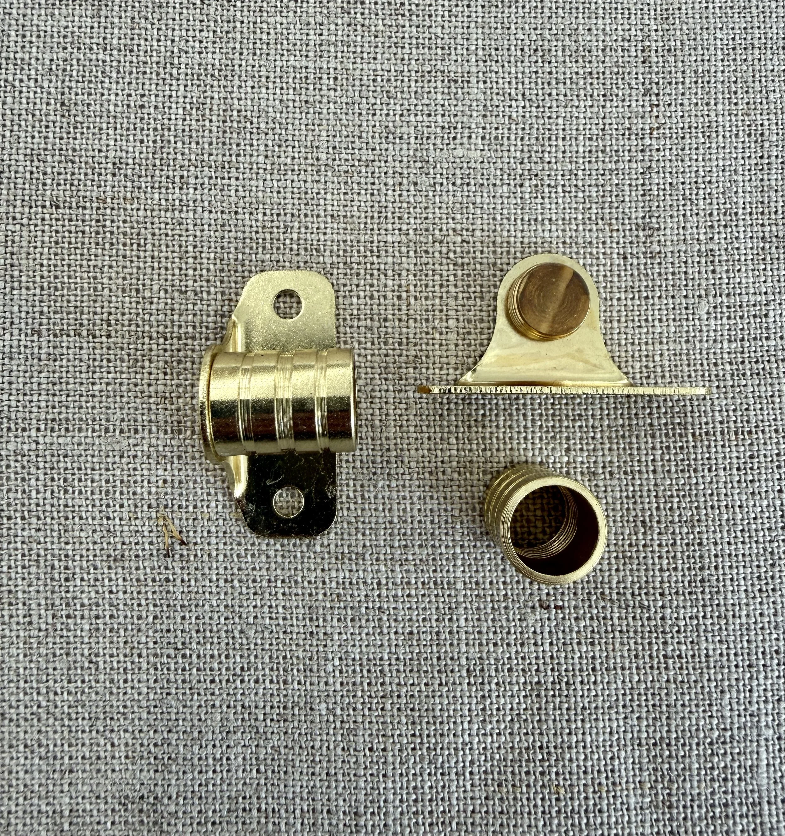 3:8 outside brass curtain mount.jpeg