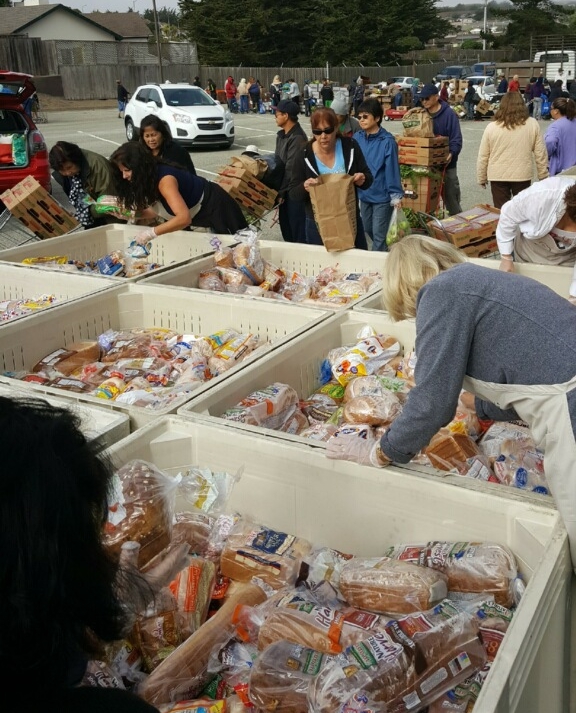 TreeHouse mortgage group took the morning to help hand out food during the marina family market
