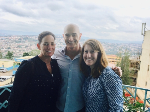The PeakChange Team at Jibu's Kigali HQ. Jim Davidson, Melanie Davidson, and Emily Winslow are all smiles. Check out that view!